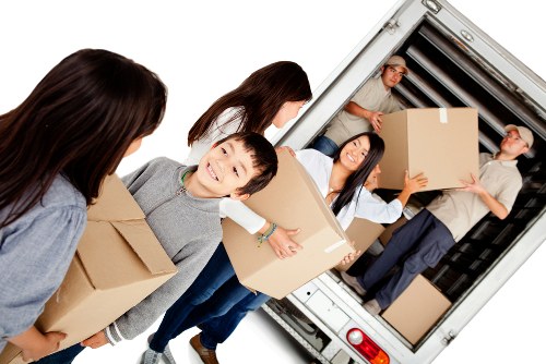Local man and van moving furniture in Hounslow residential street