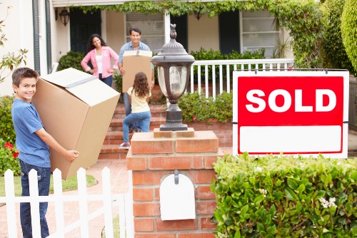 Professional movers handling a residential relocation in West London