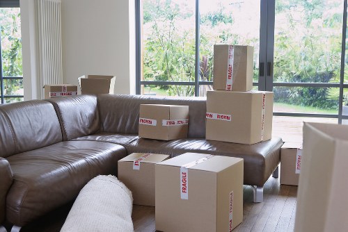 Local piano movers handling an upright instrument in Hounslow